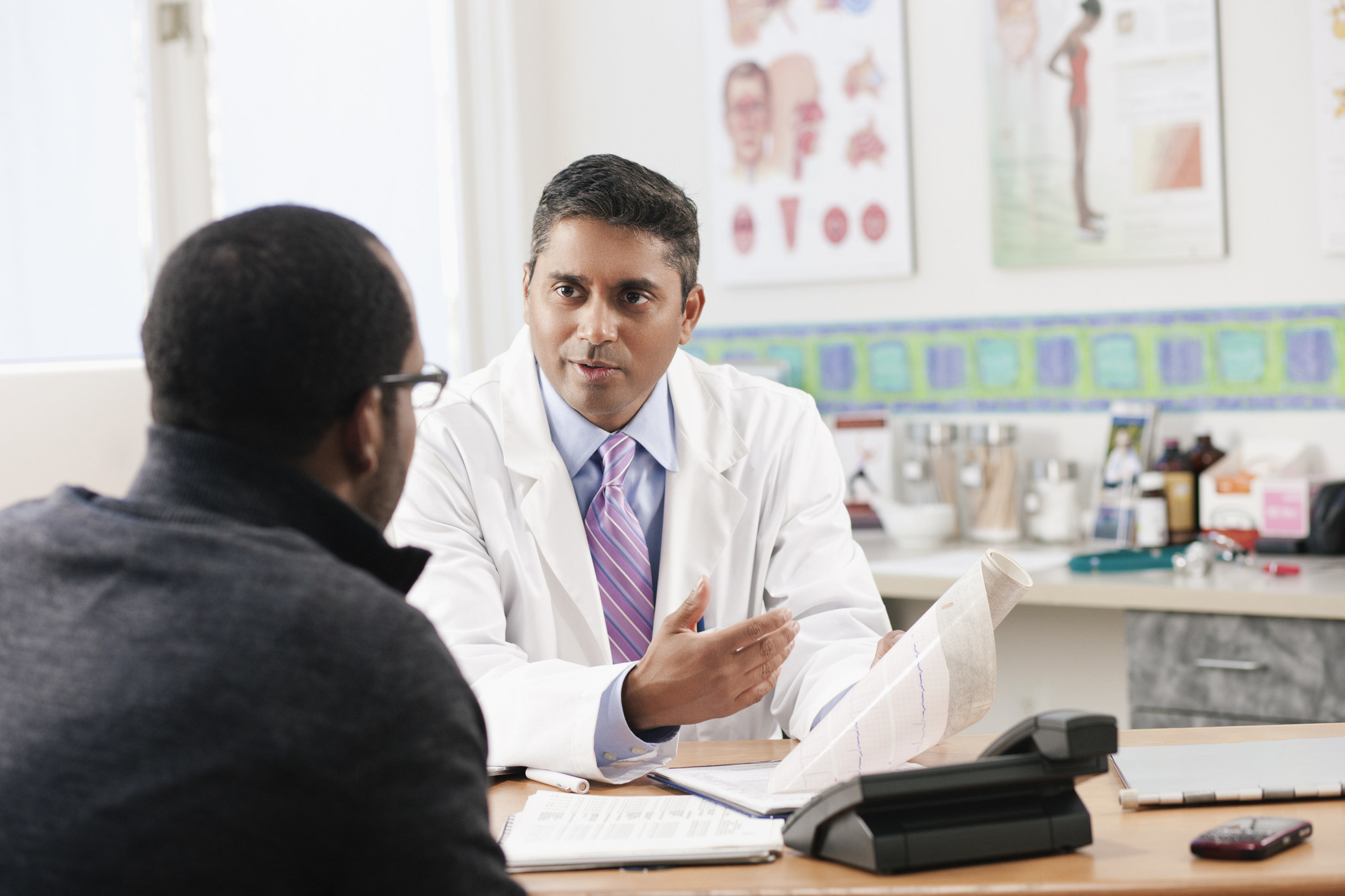 A doctor speaking with a patient