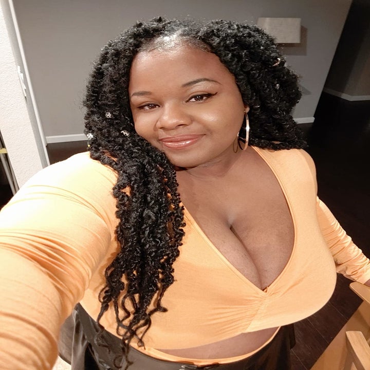 reviewer wearing the mustard yellow top