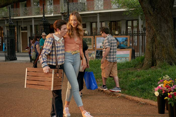 Jodi walking with her arm around a boy
