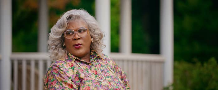 Madea talking to someone sitting next to her