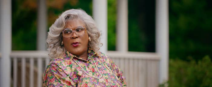 Madea talking to someone sitting next to her