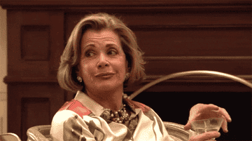 GIF of Lucille from Arrested Development rolling her eyes