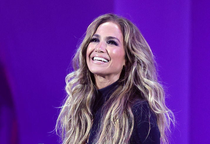 A closeup of JLO smiling