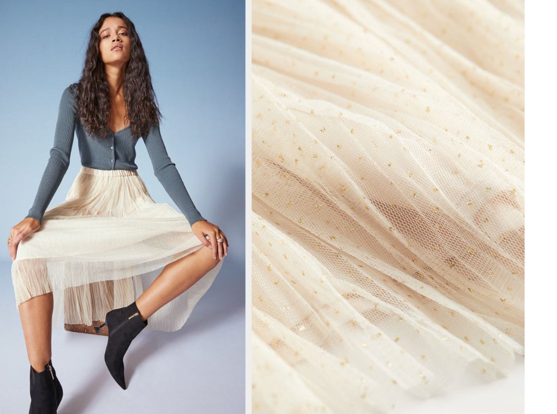 side-by-side of model wearing glittery cream skirt, and closeup of the fabric
