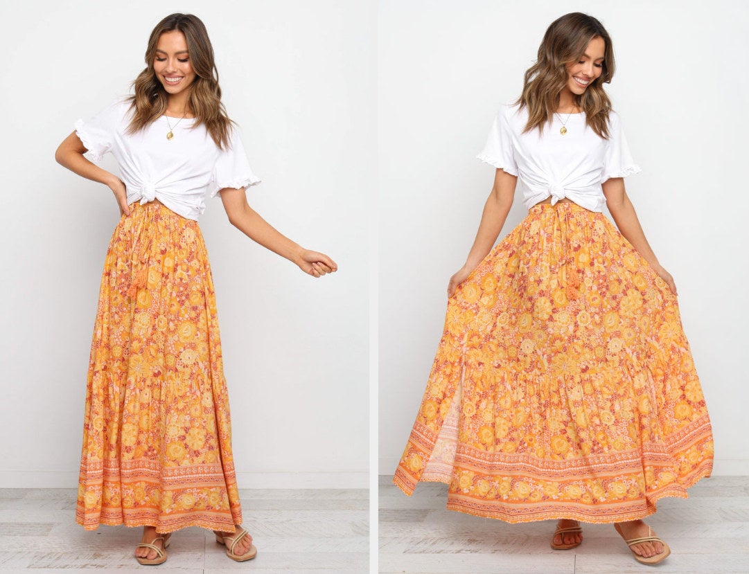 side-by-side model wearing orange floral skirt and fanning it out