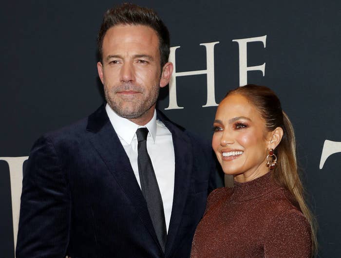 Jennifer and Ben smile on a red carpet