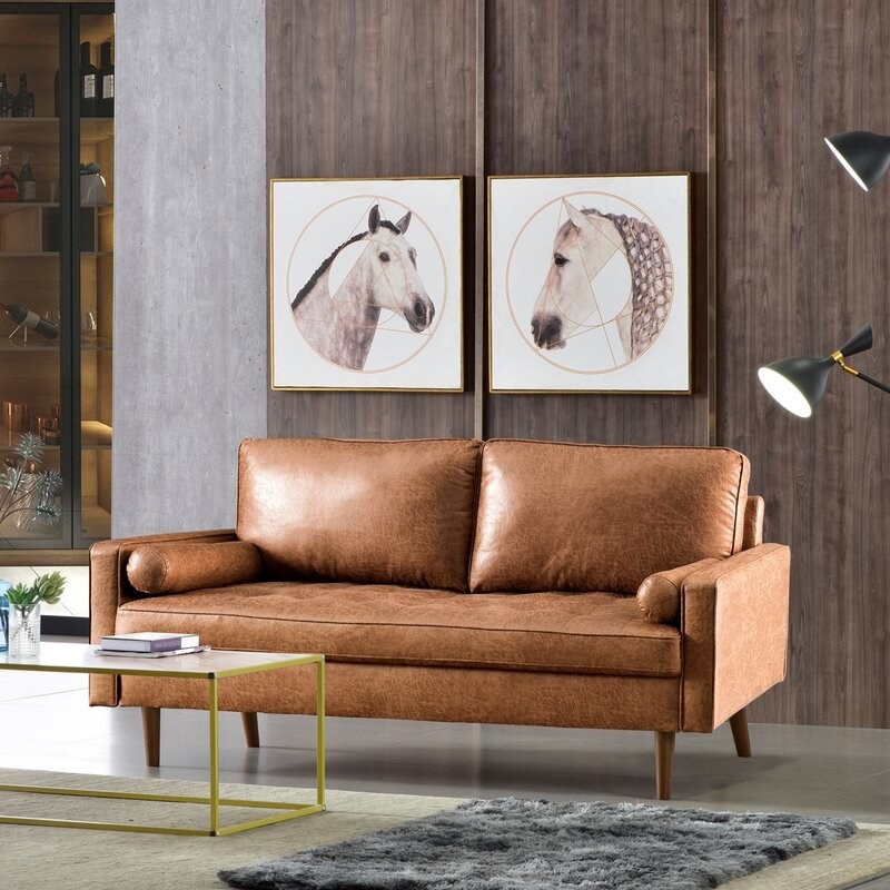 The square arm loveseat in brown faux leather
