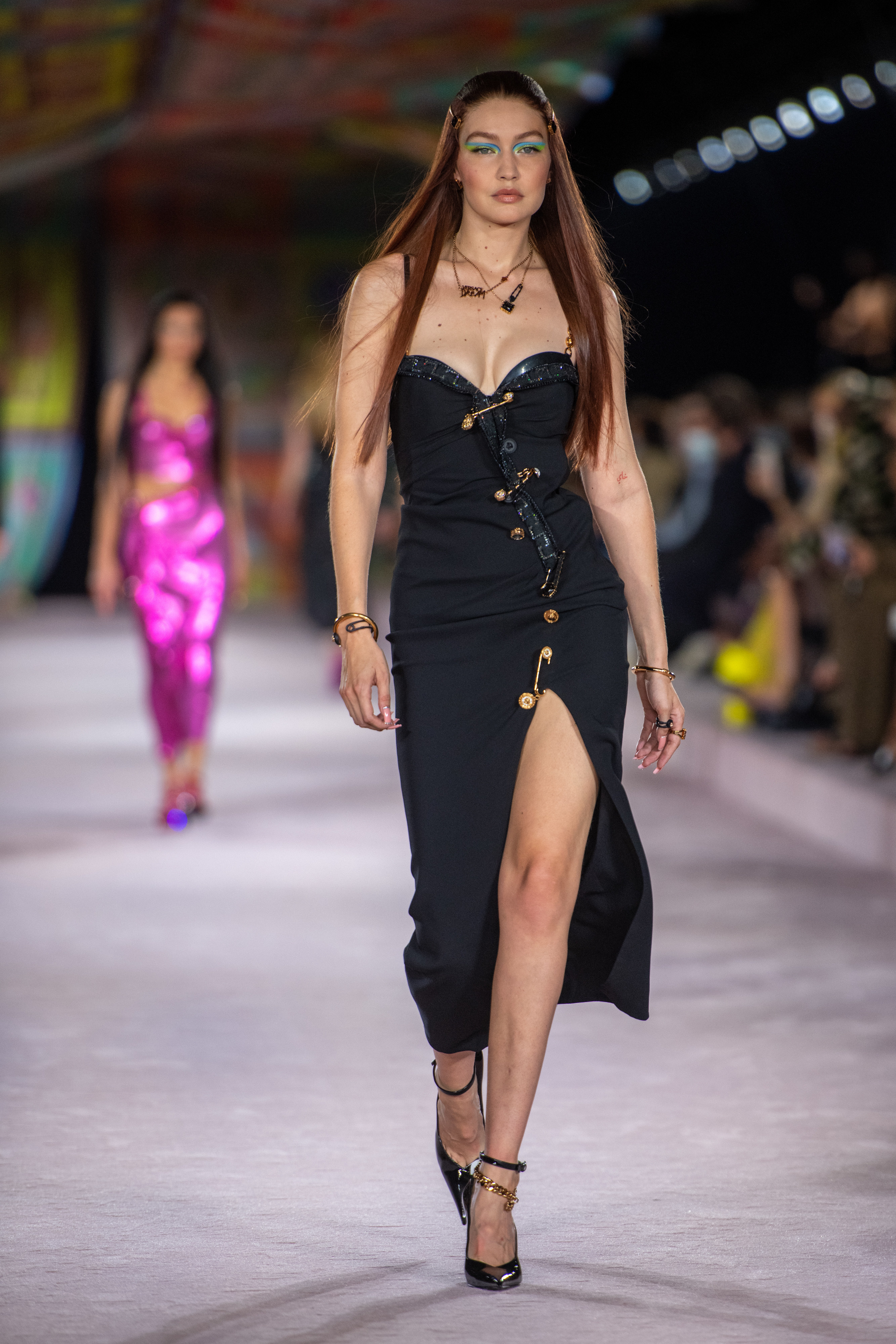 Gigi walks down the runway