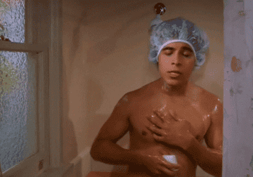 Fez from &quot;That 70&#x27;s Show&quot; showering and washing himself with a bar of soap