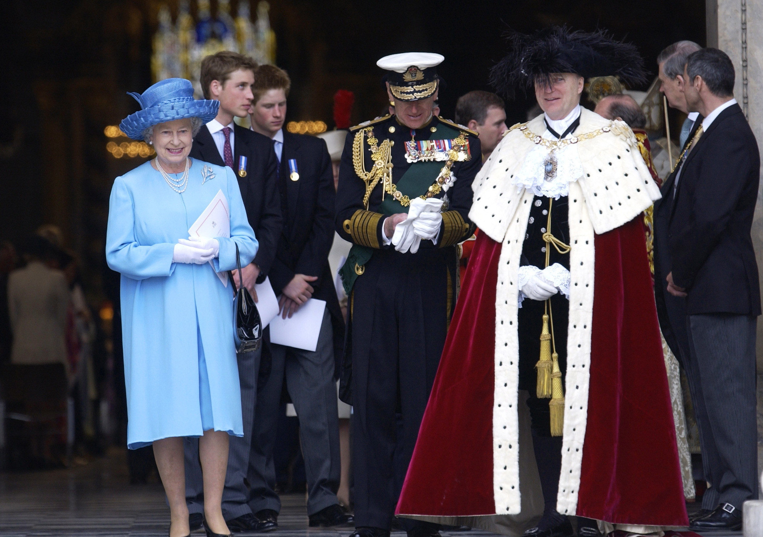 Queen Elizabeth II and the princes in London with mayors surrounding them