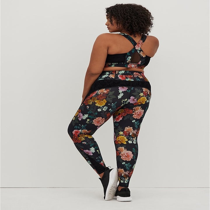 Back of model wearing the floral leggings