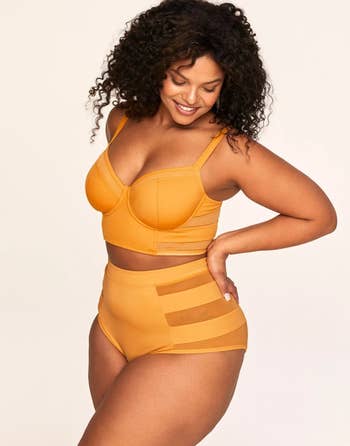 Model wearing yellow balconette bikini set