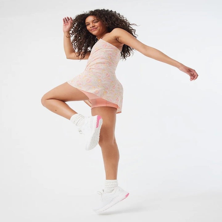 model wearing the pink marbled dress