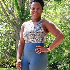 reviewer wearing the black and white tank