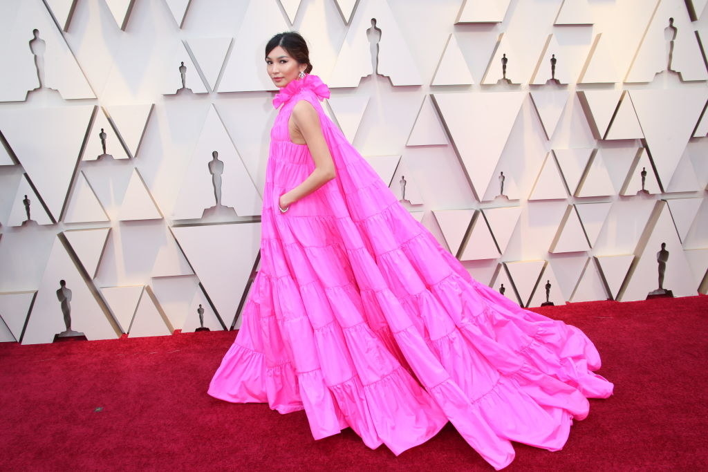 Gemma Chan in a voluminous gown with pockets