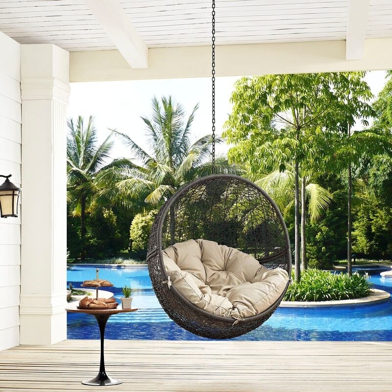 swinging chair by a pool