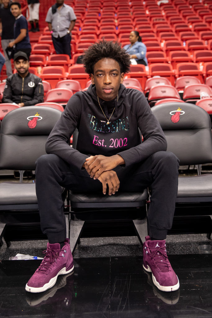 Wade posing on the sideline after a Miami Heat game in 2019