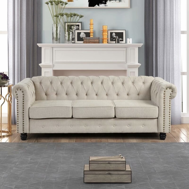 The rolled arm sofa in beige linen blend
