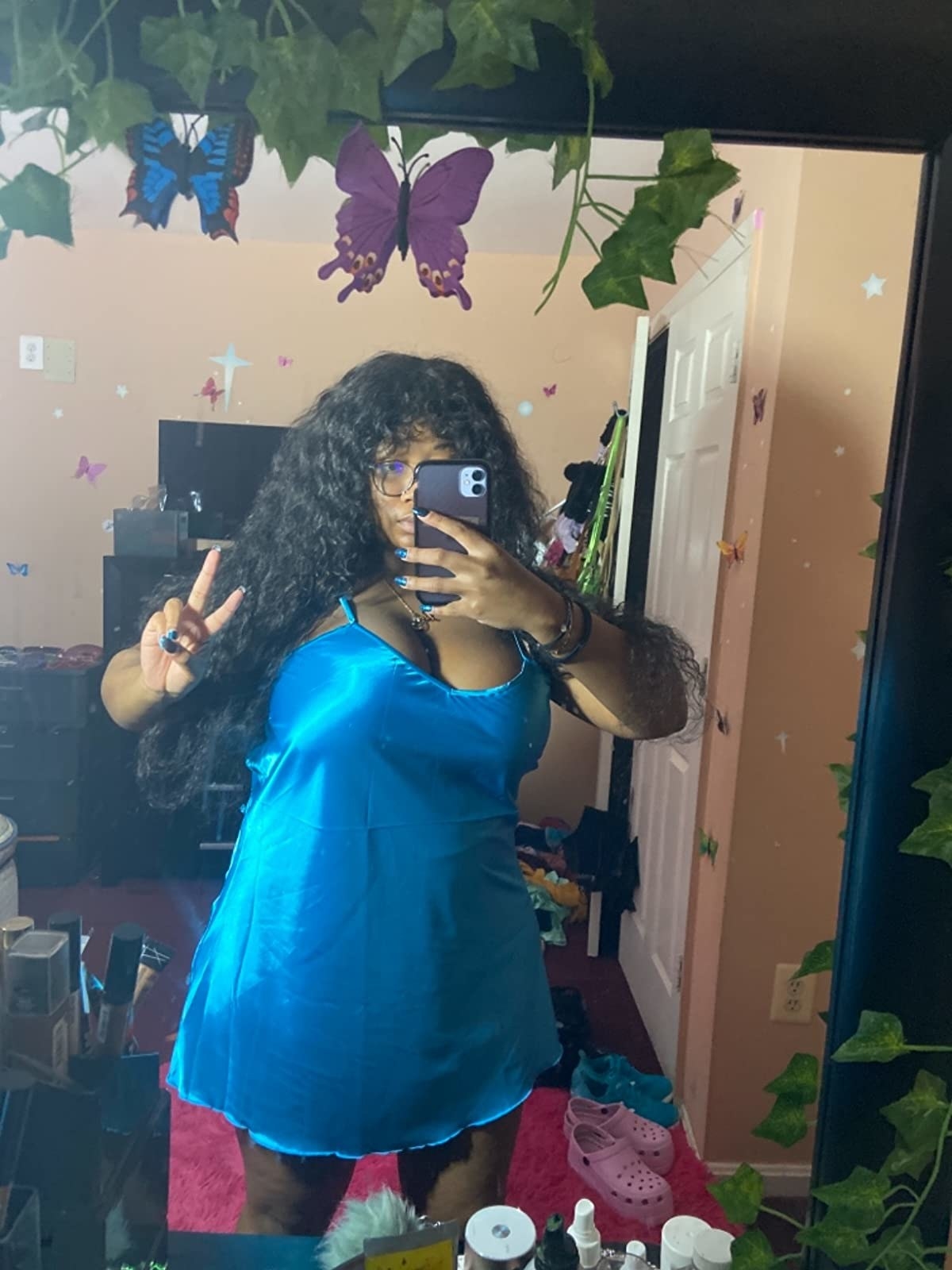 reviewer mirror selfie wearing bright blue satin nightgown