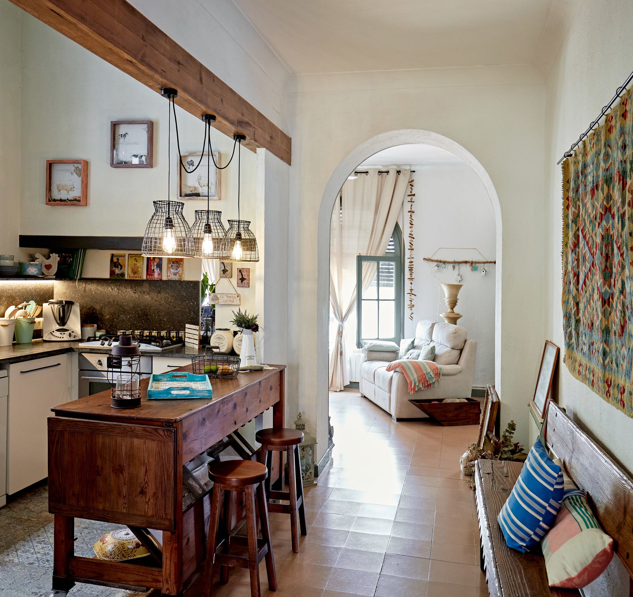 &quot;Maximalist&quot; kitchen and hallways with plenty of art, pictures, and ornate decorations that show personality