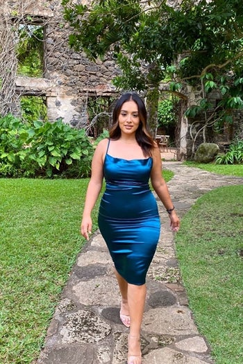 a different reviewer in the teal dress