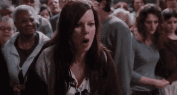 GIF of Mrs. Carmody screaming and looking manic