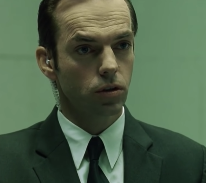 Agent Smith interrogates Neo