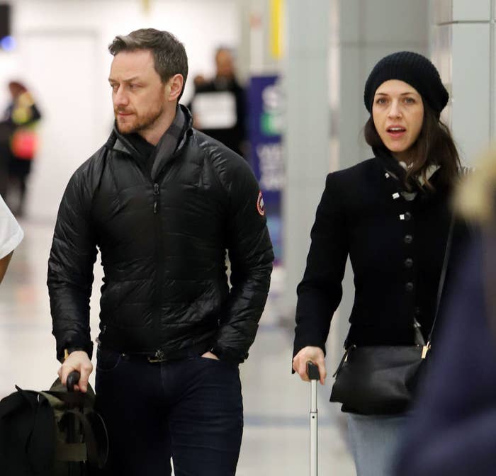 The couple walking through an airport
