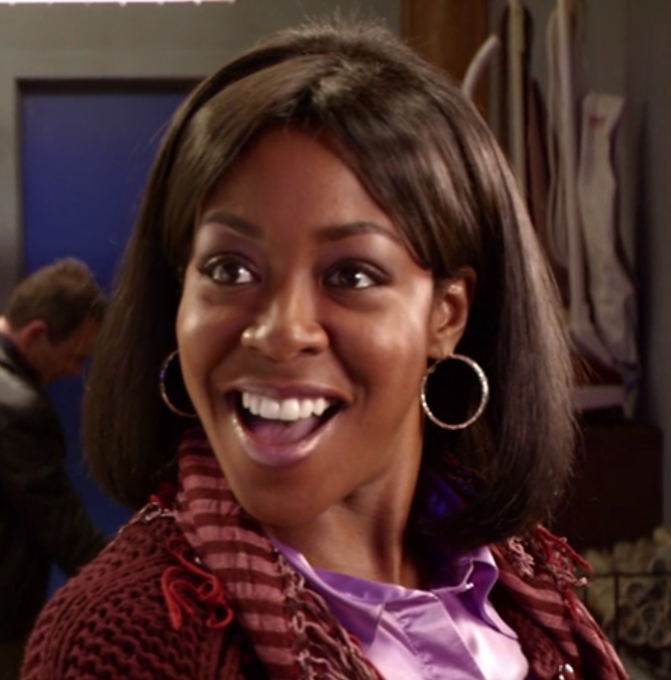 Tichina Arnold as Rochelle looks for a new TV for the family