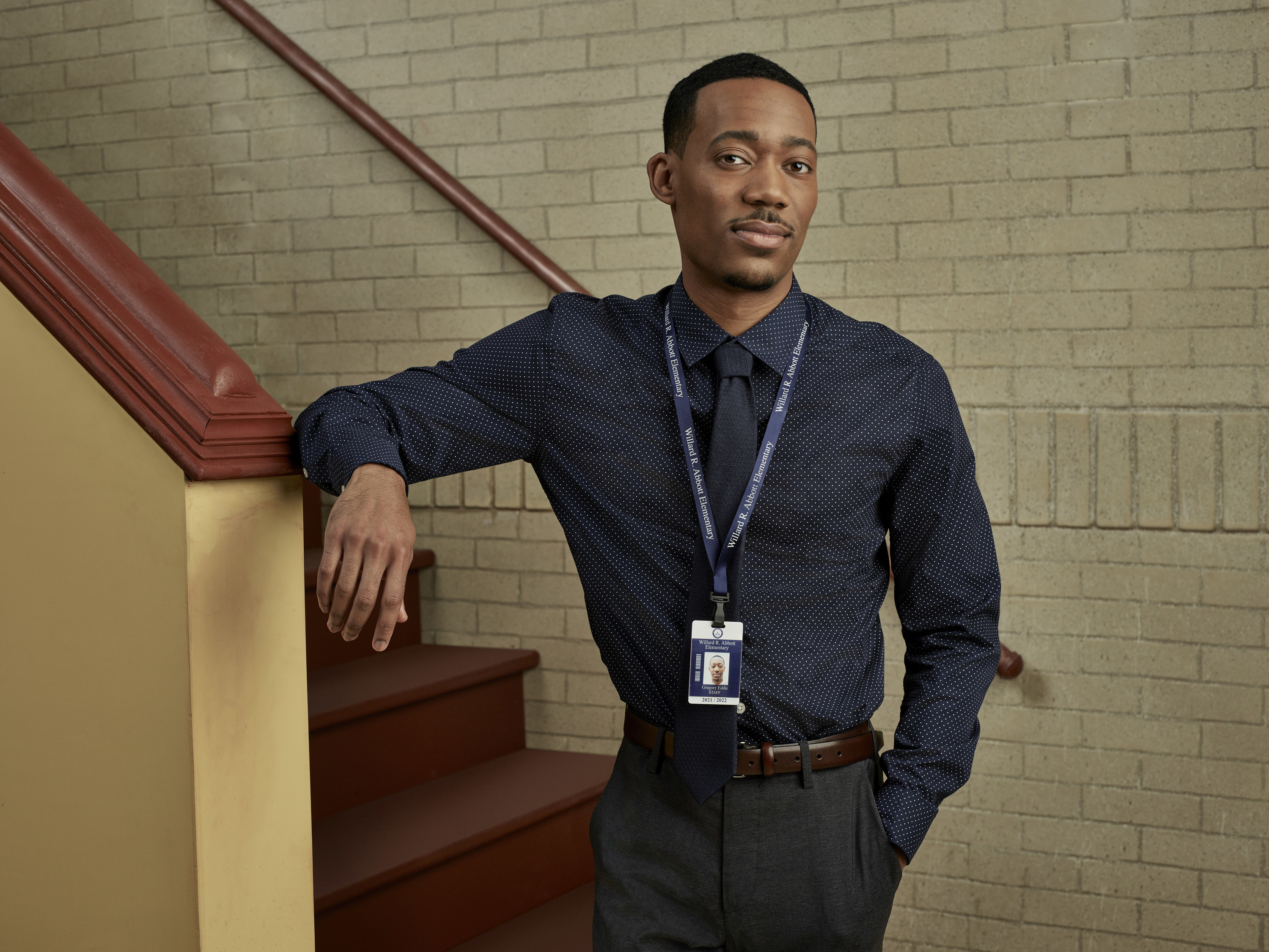 Tyler James Williams poses as Gregory in &quot;Abbott Elementary&quot;
