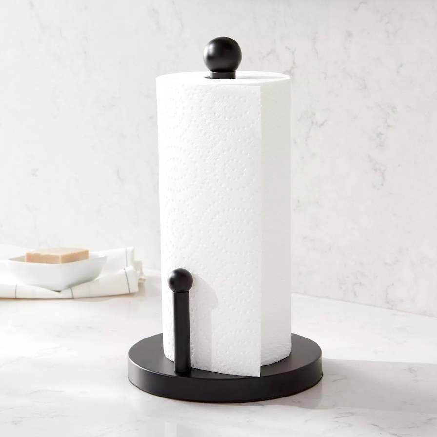 Towel holder shown with a paper towel roll