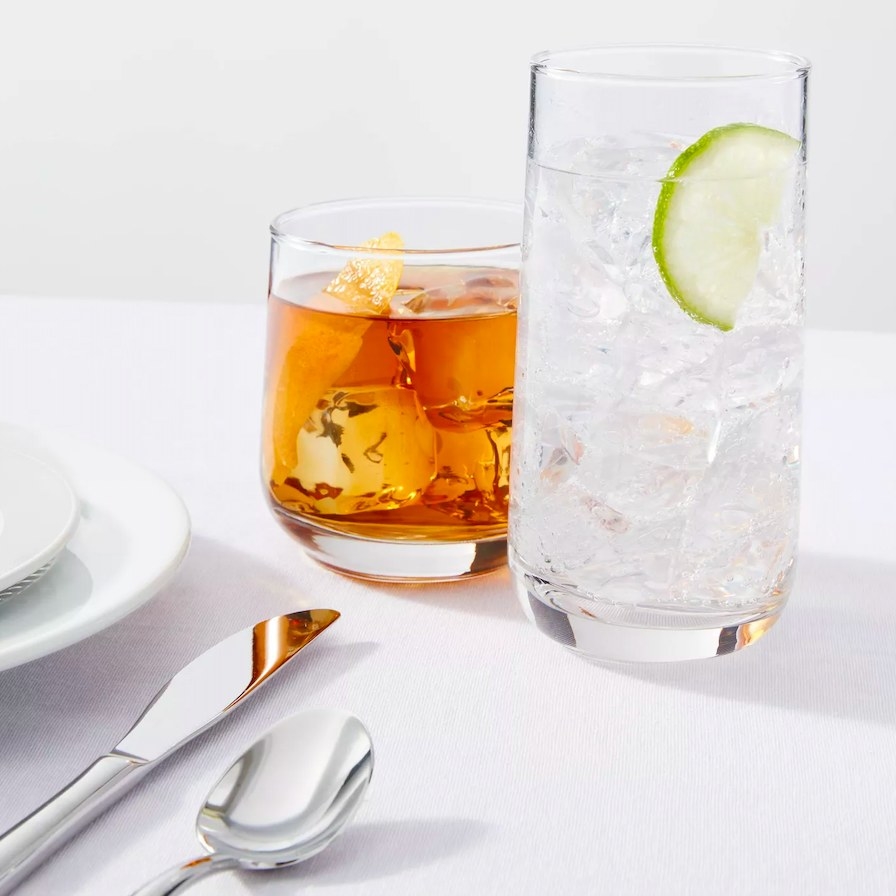 Two sizes of drinking glasses shown in a place setting