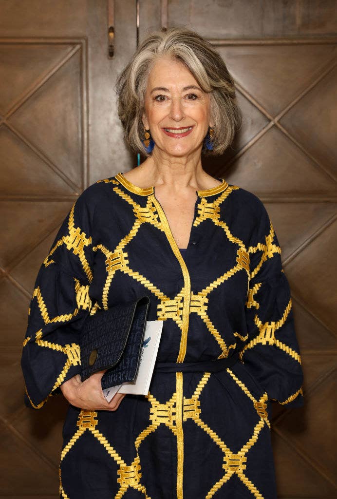 Maureen smiling on the red carpet