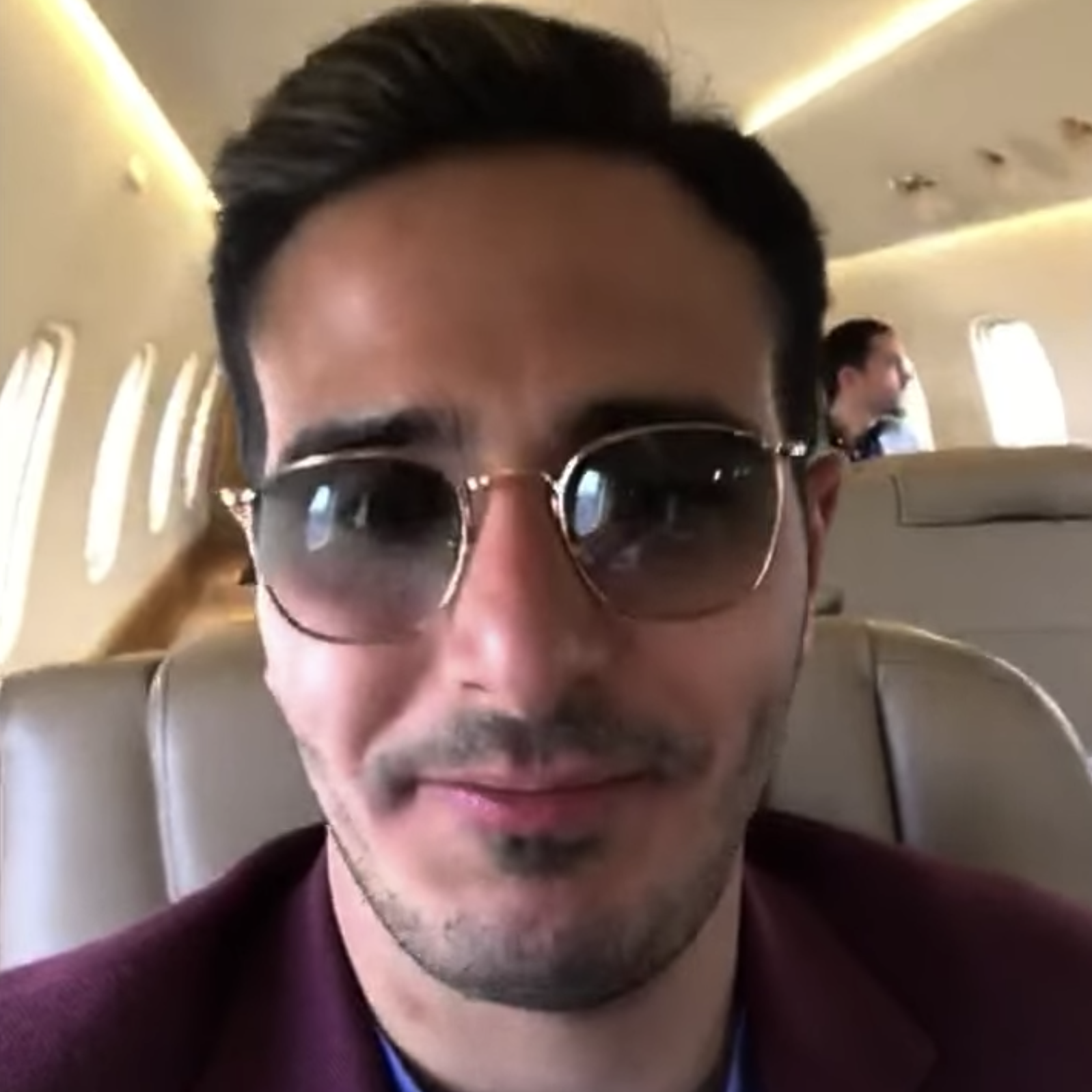 Simon taking a selfie on a private plane