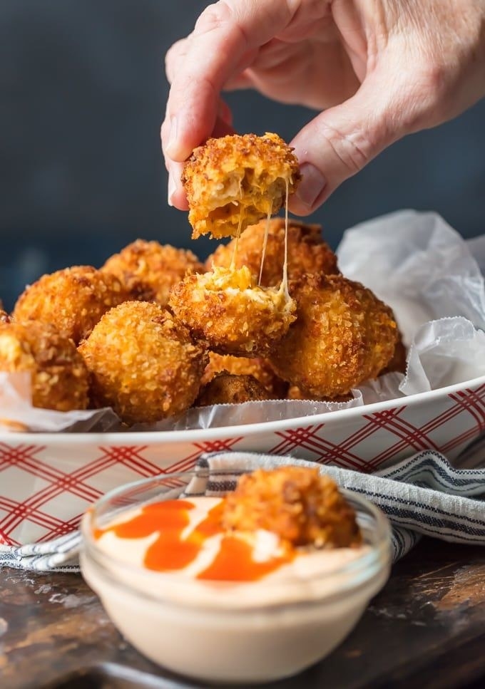 Buffalo chicken dip bites and dipping sauce.