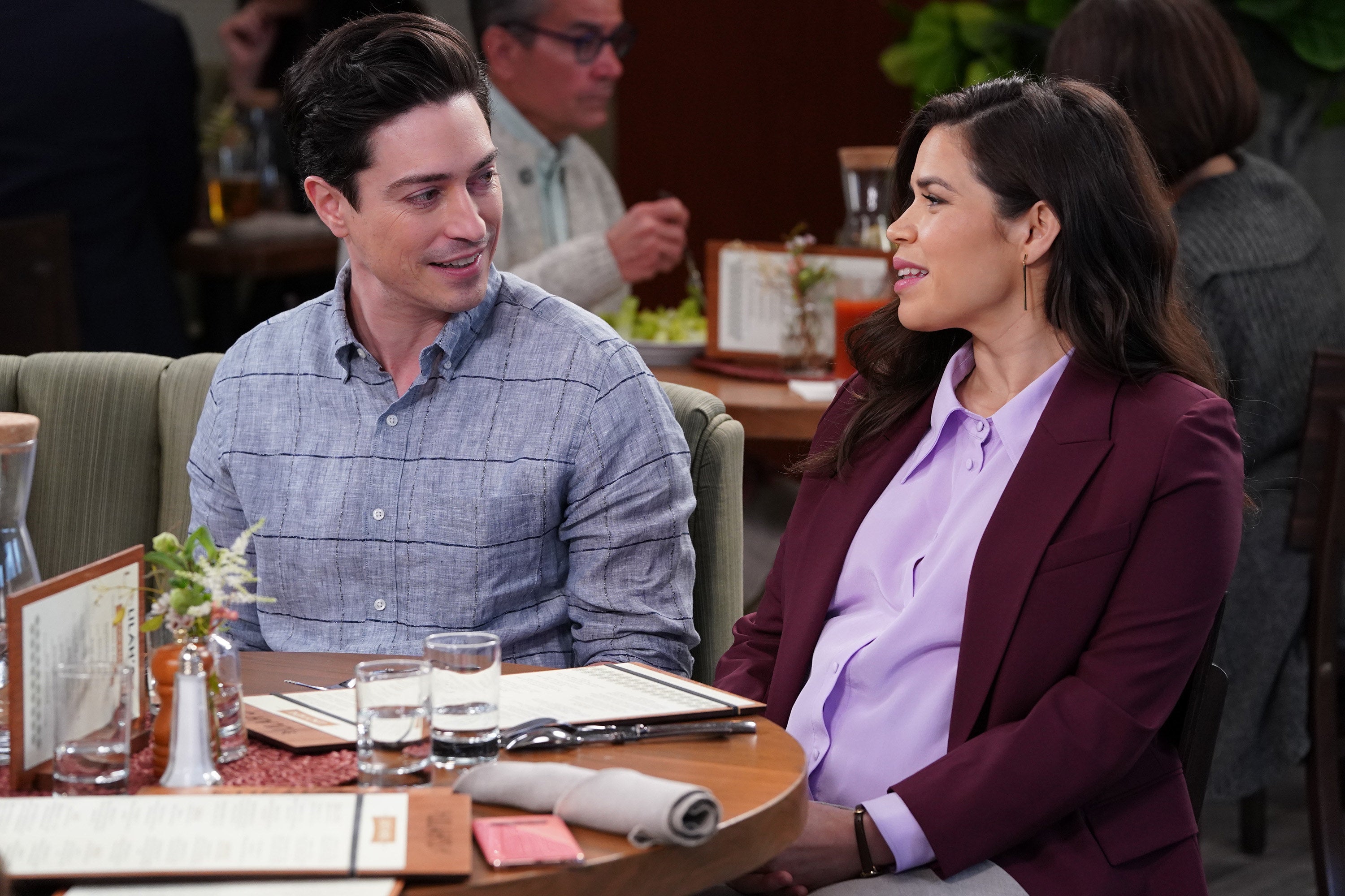 Amy and Jonah looking at each other