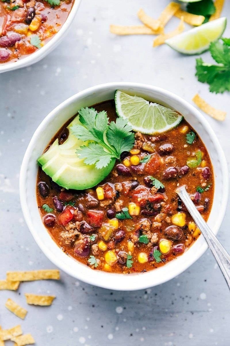 A bowl of bean, corn, and meat chili.