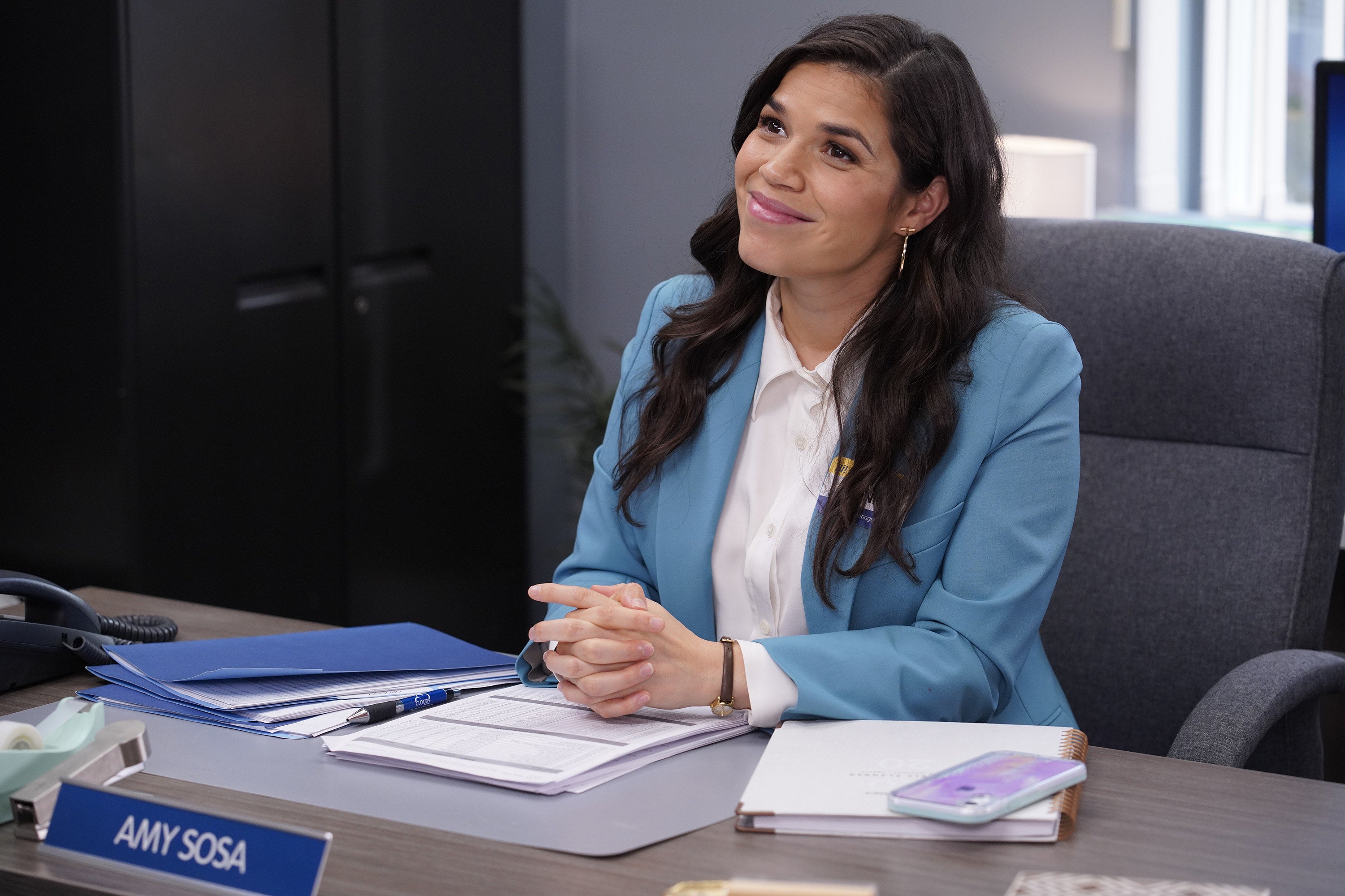 Amy sitting and smiling