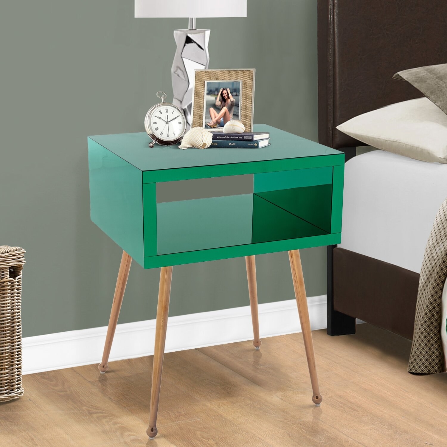 An acrylic green box that serves as side table, with legs.