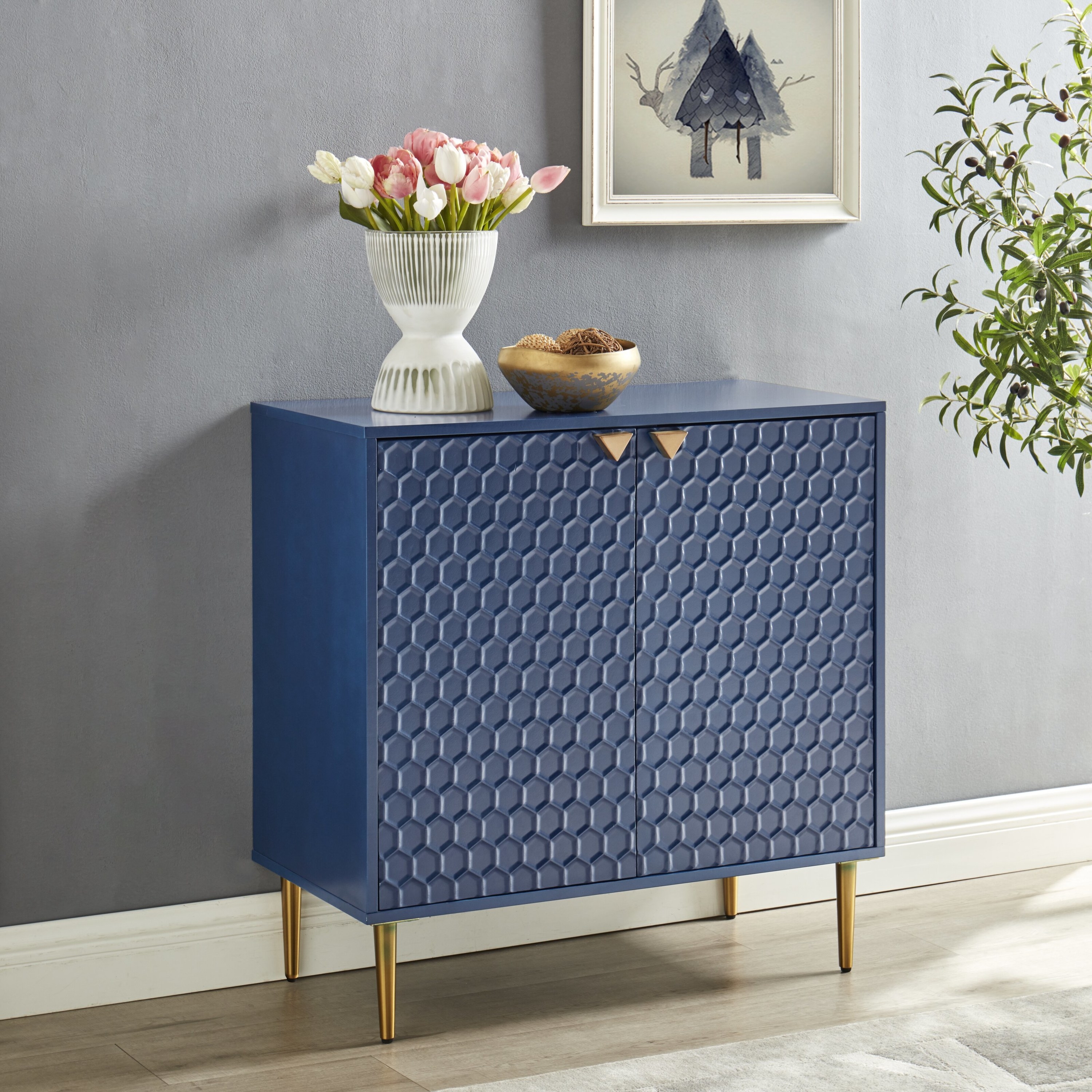A navy accent cabinet with a graphic texture on the panels.