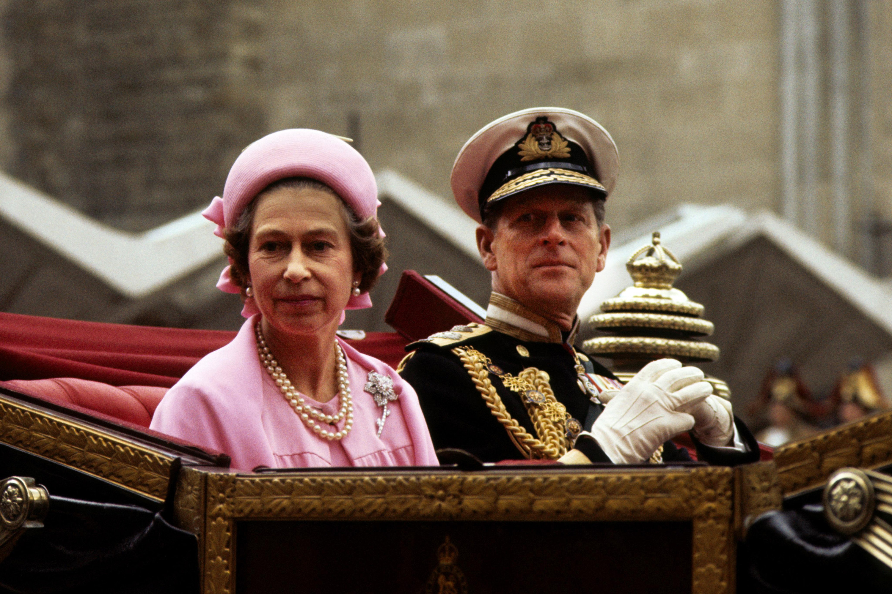 Queen elizabeth and price philip in a carriage