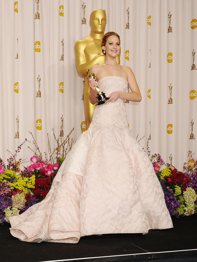 J Law posing with her award