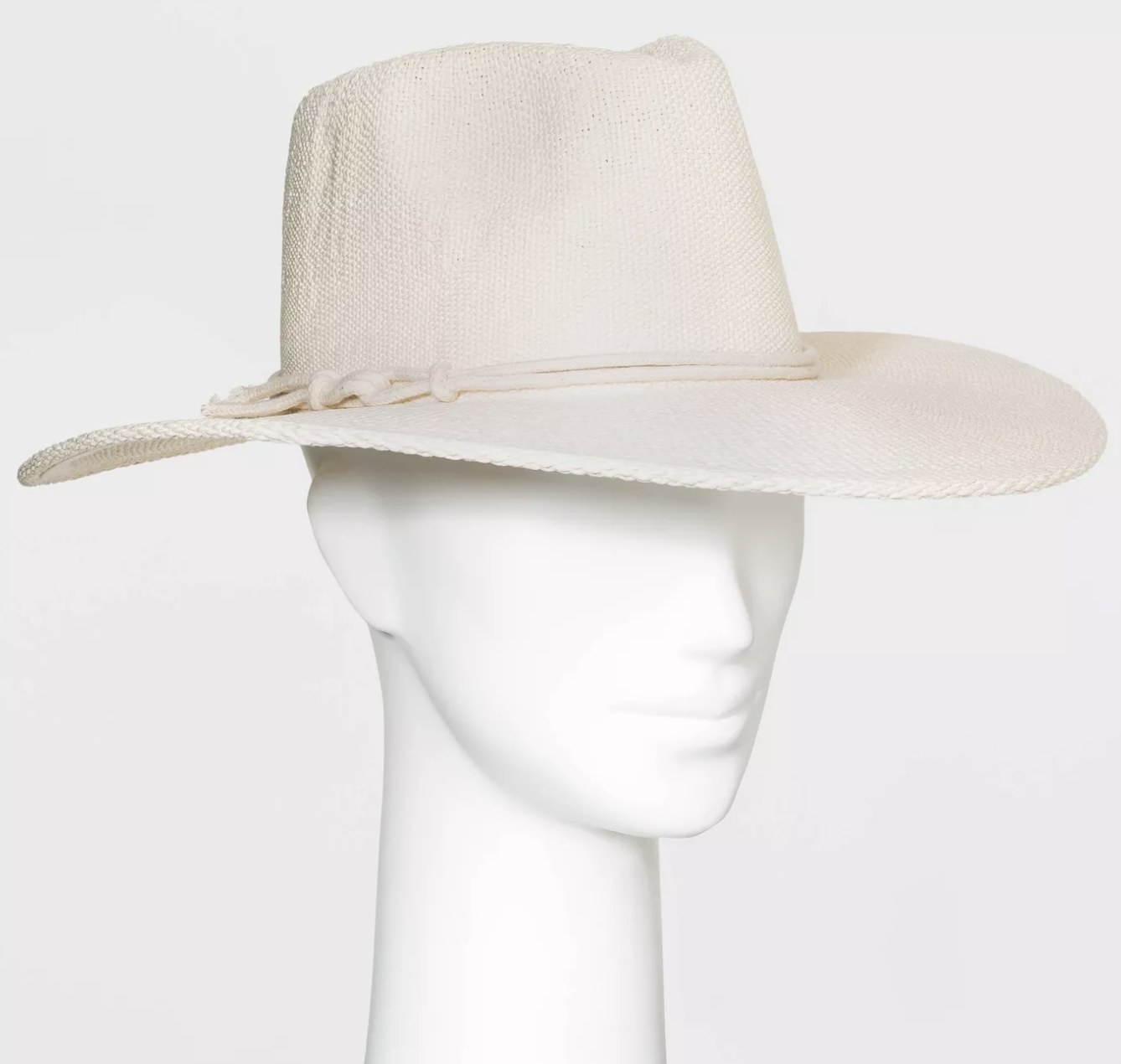 A mannequin wears the off-white hat on its head