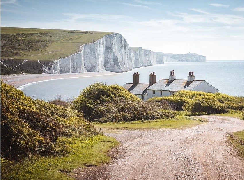 A shot of a cliffs and the ocean in Seven Sisters