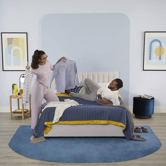 Man laying on 7-inch memory foam mattress next to woman