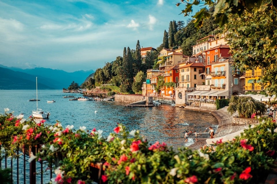 colorful buildings with beautiful foliage at the base of Lake Como in Varenna
