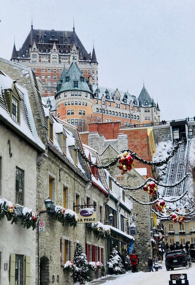 colorful buildings covered in snow in Quebec City