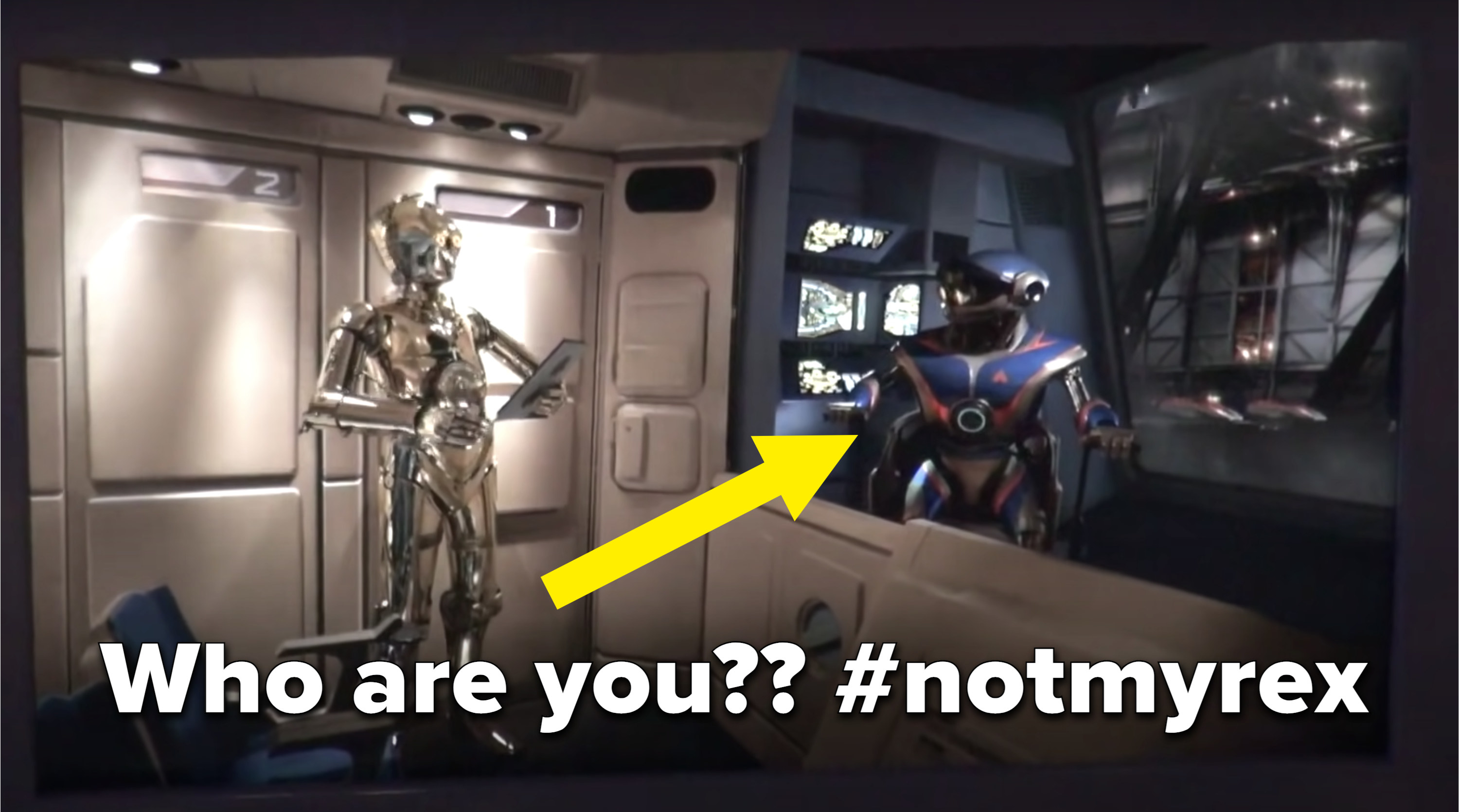C-3PO talking to another robot on the Star Tours ride