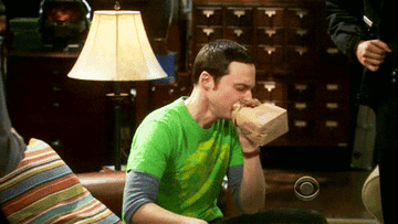 &quot;Big Bang Theory&quot; blowing into paper bag stressed out gif
