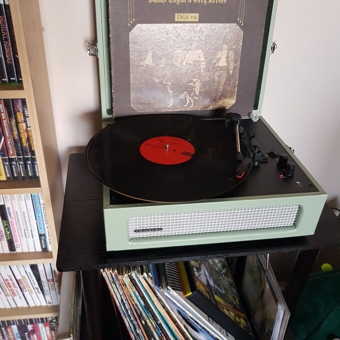 reviewer&#x27;s picture of the record player in robin&#x27;s egg blue